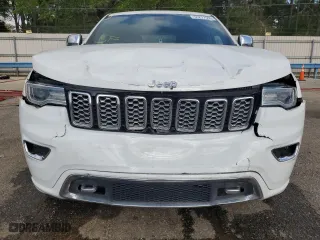 2019 Jeep Grand Cherokee Overland with VIN 1C4RJECG4KC833019, listed as a Copart auction lot 51277555 with 124,072 mi miles and Salvage Title. Bid and sale history available at carsss.com. Image 5.