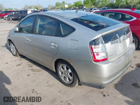 2004 Toyota Prius with VIN JTDKB20U940020058, listed as a IAAI auction lot 42142257 with 141,705 mi miles. Bid and sale history available at carsss.com. Image 3.
