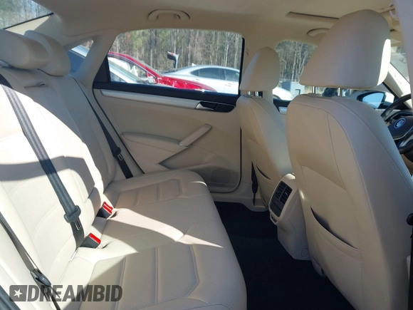 2019 Volkswagen Passat 2.0T Wolfsburg Edition with VIN 1VWLA7A32KC000818, listed as a IAAI auction lot 41711518 with 87,873 mi miles. Bid and sale history available at carsss.com. Image 8.