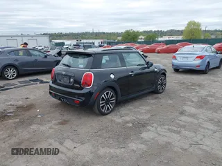 2020 MINI Hardtop Cooper S z VIN WMWXR5C00L2L44737, wystawiony jako IAAI lot #42091511 z przebiegiem 24 356 mil mil oraz . Historia ofert i sprzedaży dostępna na DreamBid. Obrazek 4.