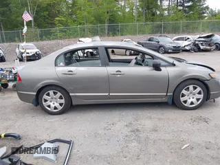 2006 Honda Civic LX z VIN 2HGFA165X6H525119, wystawiony jako IAAI lot #42314196 z przebiegiem 121 752 mil mil oraz . Historia ofert i sprzedaży dostępna na DreamBid. Obrazek 14.