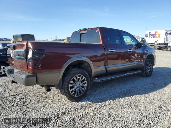 2016 Nissan Titan Platinum Reserve z VIN 1N6BA1F23GN509157, wystawiony jako Copart lot #50180435 z przebiegiem 135 035 mil mil oraz Czysty tytuł • Clean title. Historia ofert i sprzedaży dostępna na DreamBid. Obrazek 3.