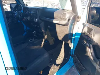 2018 Jeep Wrangler JK Unlimited Sport with VIN 1C4BJWDG6JL824178, listed as a IAAI auction lot 41420336 with 77,816 mi miles. Bid and sale history available at carsss.com. Image 5.