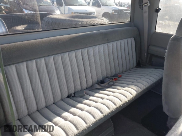 1994 GMC Sierra 1500 z VIN 2GTEK19HXR1563542, wystawiony jako IAAI lot #41733737 z przebiegiem 194 469 mil mil oraz . Historia ofert i sprzedaży dostępna na DreamBid. Obrazek 8.
