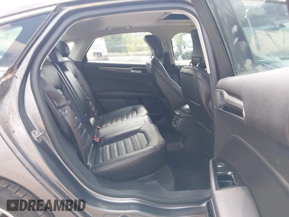 2014 Ford Fusion SE Hybrid with VIN 3FA6P0LU3ER152517, listed as a IAAI auction lot 42801042 with 209,898 mi miles and . Bid and sale history available at DreamBid. Image 8.