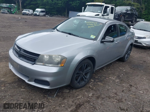 2014 Dodge Avenger SE with VIN 1C3CDZAB5EN149248, listed as a IAAI auction lot 42524423 with 120,974 mi miles and . Bid and sale history available at DreamBid. Image 2.