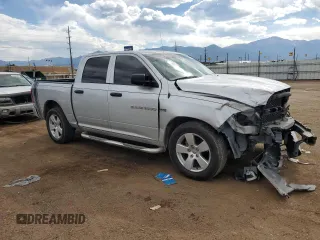 2012 Ram 1500 Express with VIN 1C6RD7KT1CS142370, listed as a Copart auction lot 60756925 with 106,627 mi miles and Salvage title. Bid and sale history available at DreamBid. Image 4.