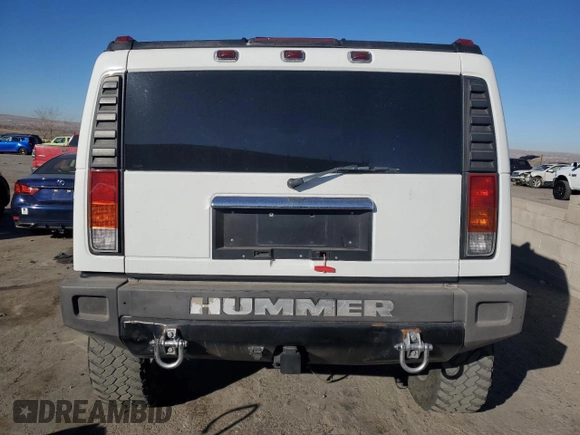 2004 Hummer H2 with VIN 5GRGN23U64H121213, listed as a Copart auction lot 42001135 with 0 mi miles and Salvage Title. Bid and sale history available at carsss.com. Image 6.