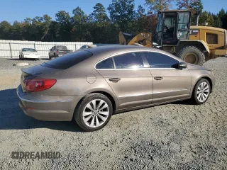 2010 Volkswagen CC Sport with VIN WVWMN7AN3AE541988, listed as a Copart auction lot 77670794 with 100,277 mi miles and Salvage Title. Bid and sale history available at DreamBid. Image 3.