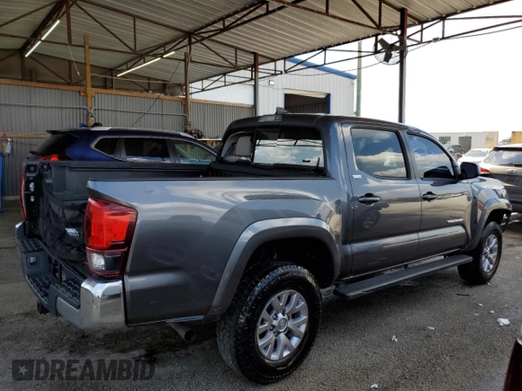 2018 Toyota Tacoma SR5 с VIN 5TFAZ5CN6JX061246, выставлен на аукционе Copart как лот 57845055 с пробегом 62 382 миль миль и Чистый • Clean title. История ставок и продаж доступна на DreamBid. Изображение 3.