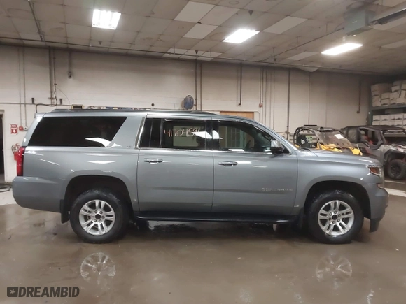 2019 Chevrolet Suburban LT with VIN 1GNSKHKC3KR195042, listed as a IAAI auction lot 41704591 with 107,166 mi miles. Bid and sale history available at carsss.com. Image 13.