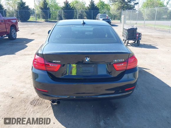 2015 BMW 4 Series 428i xDrive with VIN WBA3N9C59FK248249, listed as a IAAI auction lot 42140141 with 106,916 mi miles and . Bid and sale history available at DreamBid. Image 16.