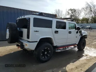 2005 Hummer H2 SUV with VIN 5GRGN23UX5H126500, listed as a Copart auction lot 77956514 with Not Provided miles and Clean Title. Bid and sale history available at carsss.com. Image 3.
