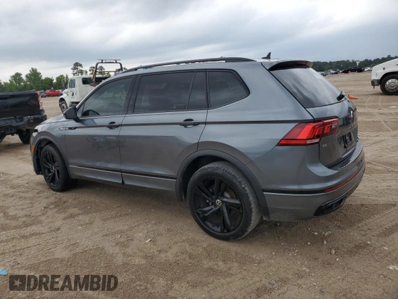 2023 Volkswagen Tiguan SE R-Line Black z VIN 3VVCB7AX6PM013498, wystawiony jako Copart lot #55750805 z przebiegiem 31 190 mil mil oraz Szkoda całkowita • Salvage title. Historia ofert i sprzedaży dostępna na DreamBid. Obrazek 2.