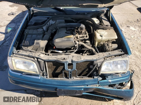 1997 Mercedes-Benz C with VIN WDBHA23EXVF507185, listed as a Copart auction lot 73716364 with 167,171 mi miles and Salvage title. Bid and sale history available at DreamBid. Image 11.