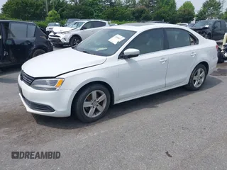 2014 Volkswagen Jetta TDI w/Premium/Nav with VIN 3VWLL7AJ4EM430524, listed as a IAAI auction lot 42268673 with 137,721 mi miles and . Bid and sale history available at DreamBid. Image 2.