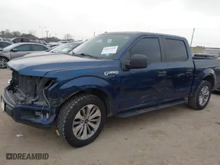 2018 Ford F-150 XL with VIN 1FTEW1CP2JFC00220, listed as a IAAI auction lot 41557424 with 263,032 mi miles. Bid and sale history available at carsss.com. Image 6.