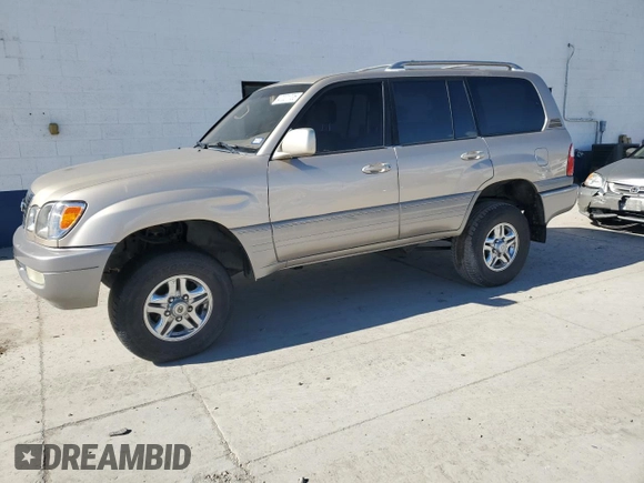 2002 Lexus LX 470 z VIN JTJHT00W523513337, wystawiony jako Copart lot #47001735 z przebiegiem 261 108 mil mil oraz Szkoda całkowita • Salvage title. Historia ofert i sprzedaży dostępna na DreamBid. Obrazek 1.