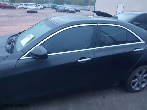 2015 Cadillac ATS Luxury with VIN 1G6AB5R35F0121403, listed as a IAAI auction lot 41823829 with 194,632 mi miles. Bid and sale history available at carsss.com. Image 14.