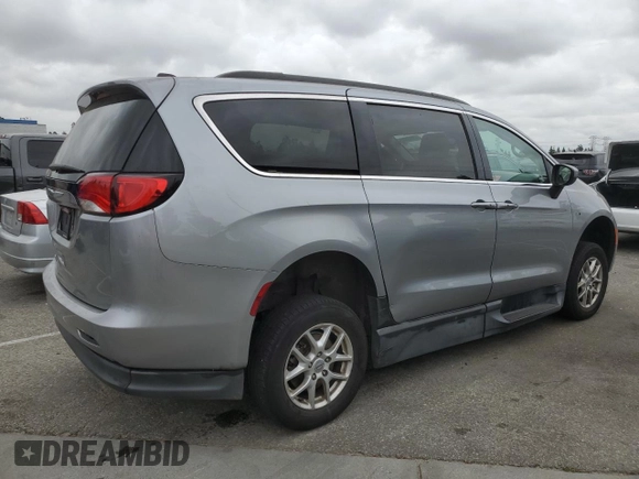 2021 Chrysler Voyager LXI with VIN 2C4RC1DG0MR558048, listed as a Copart auction lot 53742615 with 142,359 mi miles and Clean Title. Bid and sale history available at carsss.com. Image 3.