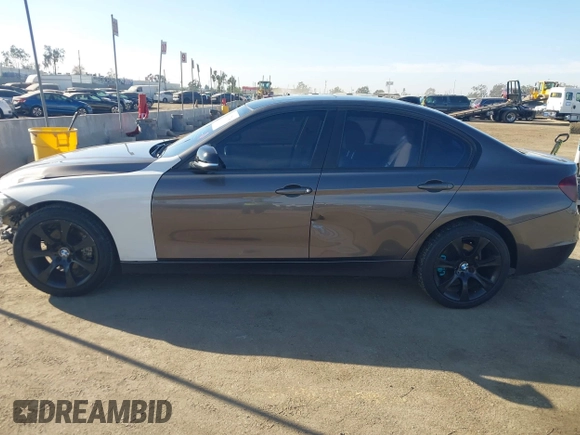 2014 BMW 3 Series 328i with VIN WBA3A5C56EP603819, listed as a IAAI auction lot 41217764 with 156,140 mi miles and . Bid and sale history available at carsss.com. Image 14.