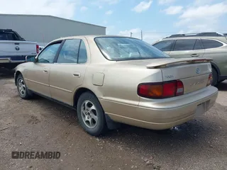1996 Toyota Camry DX with VIN 4T1BG12K7TU781388, listed as a IAAI auction lot 42089118 with 196,988 mi miles. Bid and sale history available at carsss.com. Image 3.