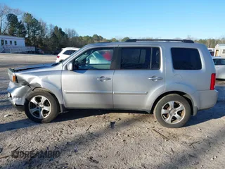 2015 Honda Pilot EX-L with VIN 5FNYF4H57FB006655, listed as a IAAI auction lot 41822385 with 125,915 mi miles and . Bid and sale history available at carsss.com. Image 13.