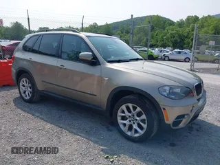 2012 BMW X5 35i z VIN 5UXZV4C5XCL761191, wystawiony jako IAAI lot #42490900 z przebiegiem 187 276 mil mil oraz . Historia ofert i sprzedaży dostępna na DreamBid. Obrazek 1.