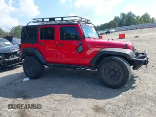 2016 Jeep Wrangler Unlimited Rubicon with VIN 1C4HJWFG7GL128994, listed as a IAAI auction lot 40503403 with 85,950 mi miles. Bid and sale history available at carsss.com. Image 13.