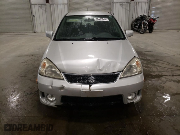2005 Suzuki Aerio SX z VIN JS2RC61H555300879, wystawiony jako Copart lot #80481084 z przebiegiem 129 196 mil mil oraz Szkoda całkowita • Salvage title. Historia ofert i sprzedaży dostępna na DreamBid. Obrazek 5.