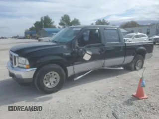 2002 Ford F-250 XL with VIN 3FTNW20F72MA07306, listed as a Copart auction lot 80054914 with 182,808 mi miles and Salvage Title. Bid and sale history available at DreamBid. Image 1.