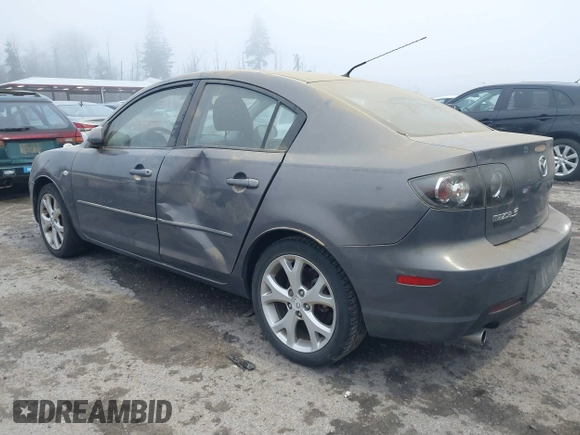 2009 Mazda Mazda3 i Touring Value with VIN JM1BK32G291214834, listed as a IAAI auction lot 40894075 with 128,040 mi miles. Bid and sale history available at carsss.com. Image 3.