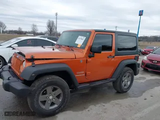 2011 Jeep Wrangler Sport with VIN 1J4AA2D16BL589390, listed as a IAAI auction lot 41478801 with 153,013 mi miles. Bid and sale history available at carsss.com. Image 14.