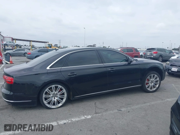 2015 Audi A8 L 4.0T with VIN WAU32AFD4FN033471, listed as a IAAI auction lot 42120112 with 174,882 mi miles. Bid and sale history available at carsss.com. Image 13.