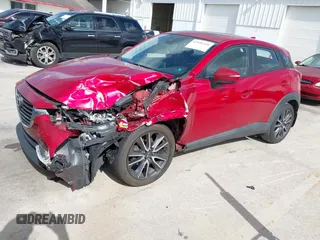 2018 Mazda CX-3 Touring with VIN JM1DKDC7XJ0318219, listed as a IAAI auction lot 41941104 with 86,186 mi miles. Bid and sale history available at carsss.com. Image 17.