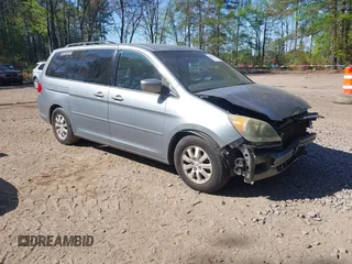 2008 Honda Odyssey EX with VIN 5FNRL38428B067056, listed as a IAAI auction lot 42051312 with 199,405 mi miles. Bid and sale history available at carsss.com. Image 1.
