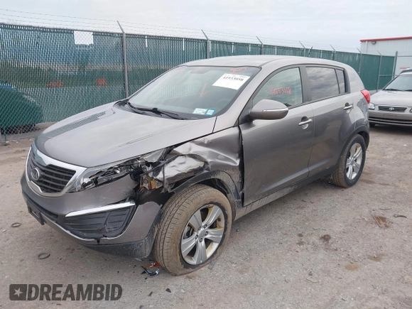 2012 Kia Sportage LX with VIN KNDPB3A28C7332354, listed as a IAAI auction lot 41933058 with 75,938 mi miles. Bid and sale history available at carsss.com. Image 2.