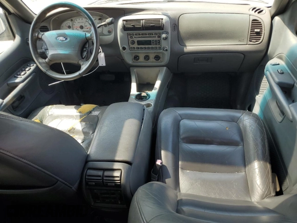 2002 Ford Explorer Sport Trac Value with VIN 1FMZU67E42UD15004, listed as a Copart auction lot 54129135 with 129,952 mi miles and Salvage title. Bid and sale history available at DreamBid. Image 8.