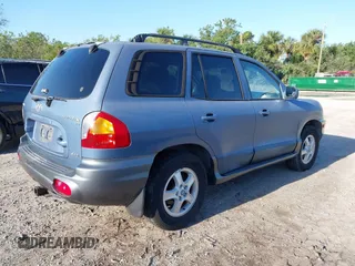 2003 Hyundai Santa Fe GLS with VIN KM8SC73D33U469955, listed as a IAAI auction lot 41989360 with 66,798 mi miles. Bid and sale history available at carsss.com. Image 4.