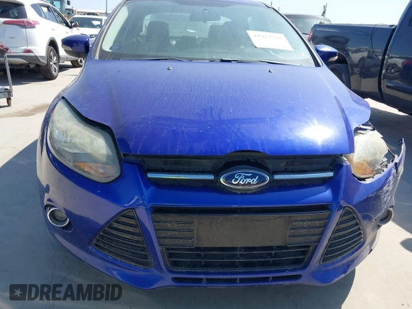 2013 Ford Focus Titanium with VIN 1FADP3J25DL163591, listed as a IAAI auction lot 41973388 with 133,071 mi miles and . Bid and sale history available at carsss.com. Image 12.