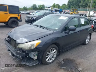 2012 Subaru Impreza Premium with VIN JF1GPAC69CH201245, listed as a IAAI auction lot 42687253 with 169,089 mi miles and . Bid and sale history available at DreamBid. Image 2.