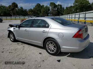 2010 Ford Fusion S with VIN 3FAHP0GA0AR421219, listed as a Copart auction lot 50930025 with 169,539 mi miles and Salvage Title. Bid and sale history available at carsss.com. Image 2.