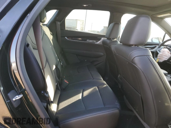 2024 Cadillac XT5 AWD Premium Luxury z VIN 1GYKNDRS7RZ710294, wystawiony jako Copart lot #88005475 z przebiegiem 15 647 mil mil oraz Szkoda całkowita • Salvage title. Historia ofert i sprzedaży dostępna na DreamBid. Obrazek 11.