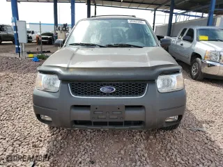 2003 Ford Escape XLT Popular with VIN 1FMYU03103KC43310, listed as a Copart auction lot 50362285 with 69,308 mi miles and Salvage Title. Bid and sale history available at carsss.com. Image 5.