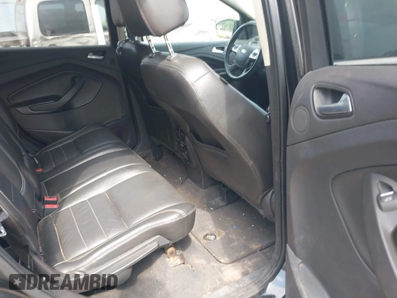 2014 Ford Escape Titanium with VIN 1FMCU0JX1EUD71953, listed as a IAAI auction lot 42036023 with 165,624 mi miles. Bid and sale history available at carsss.com. Image 8.
