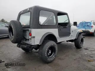 1985 Jeep CJ z VIN 1JCCM87AXFT128119, wystawiony jako Copart lot #42979045 z przebiegiem 83 932 mil mil oraz Tytuł czysty. Historia ofert i sprzedaży dostępna na DreamBid. Obrazek 3.