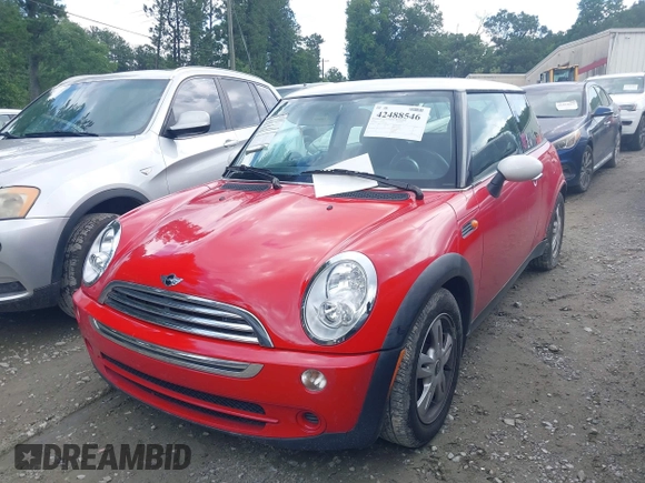 2006 MINI Hardtop with VIN WMWRC33596TK67276, listed as a IAAI auction lot 42488546 with 41,229 mi miles and . Bid and sale history available at DreamBid. Image 2.