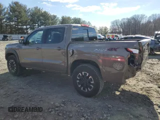 2024 Nissan Frontier Pro-4X with VIN 1N6ED1EK2RN656885, listed as a Copart auction lot 46604165 with 4,390 mi miles and Salvage title. Bid and sale history available at DreamBid. Image 2.