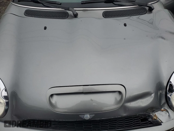 2005 MINI Hardtop S с VIN WMWRE33465TD90908, выставлен на аукционе Copart как лот 50671585 с пробегом Не указан миль и Списание • Salvage title. История ставок и продаж доступна на DreamBid. Изображение 11.