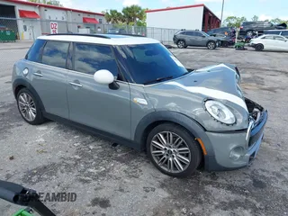 2018 MINI Hardtop 4 Door Cooper S with VIN WMWXU3C55J2F51056, listed as a IAAI auction lot 42484892 with 107,460 mi miles and . Bid and sale history available at DreamBid. Image 1.